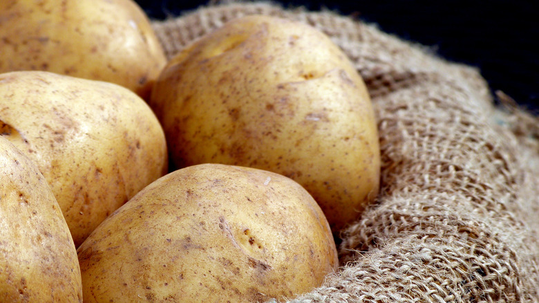 russet potatoes in burlap