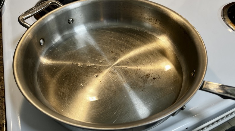 heating oil in skillet