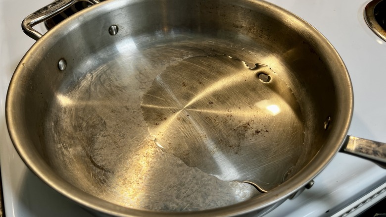 heating oil in skillet