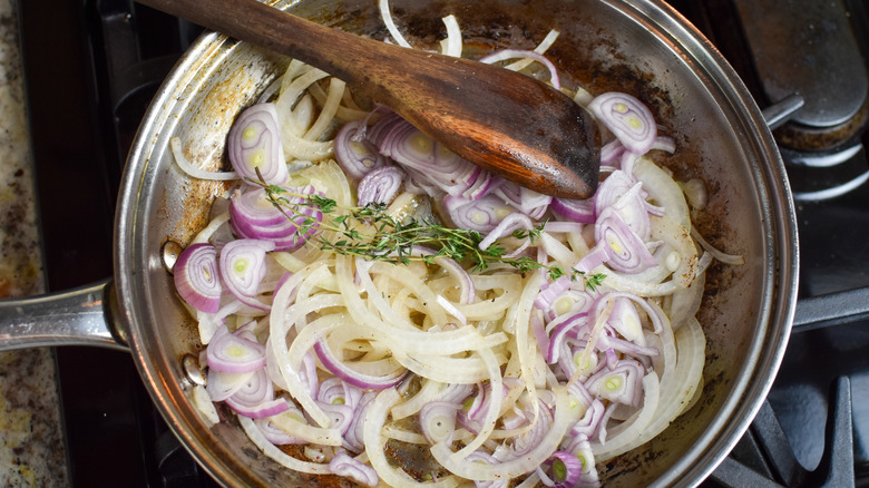 pan cooking onions and shallots