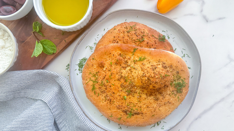 Maneesh bread on a white plate