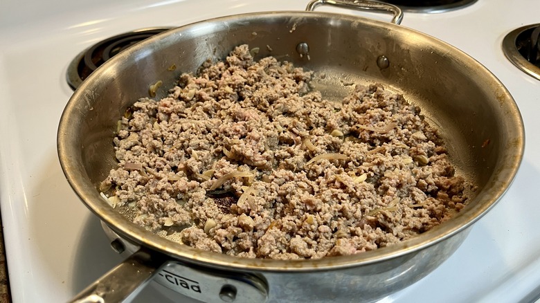 cooked ground chicken in a large skillet