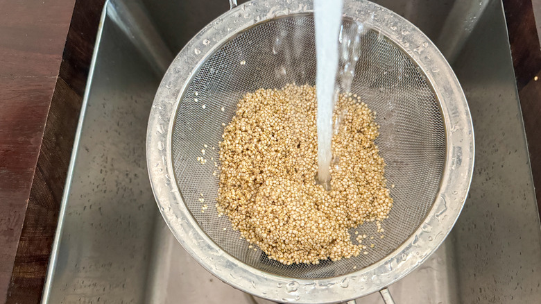 water running over quinoa