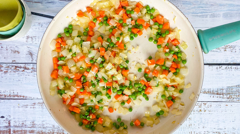 veggies cooking in pan