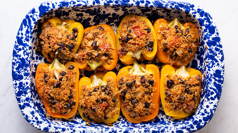 quinoa stuffed peppers in a casserole dish