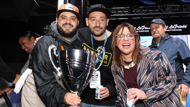 Rachael Ray with people's choice award winner at NYCWFF Burger Bash