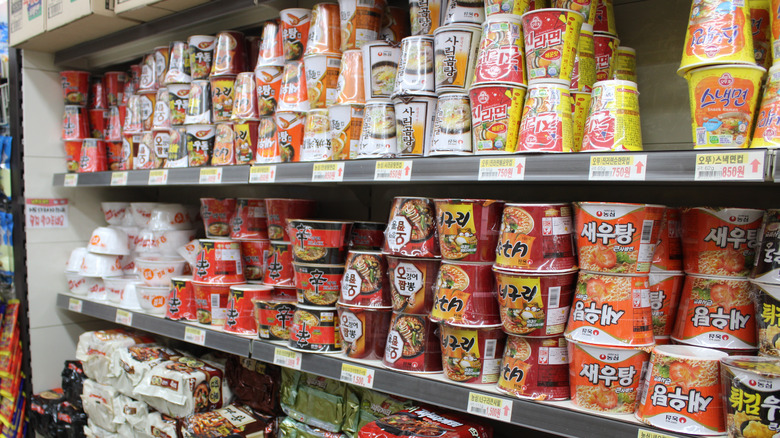 Many kinds of instant ramen on store shelf