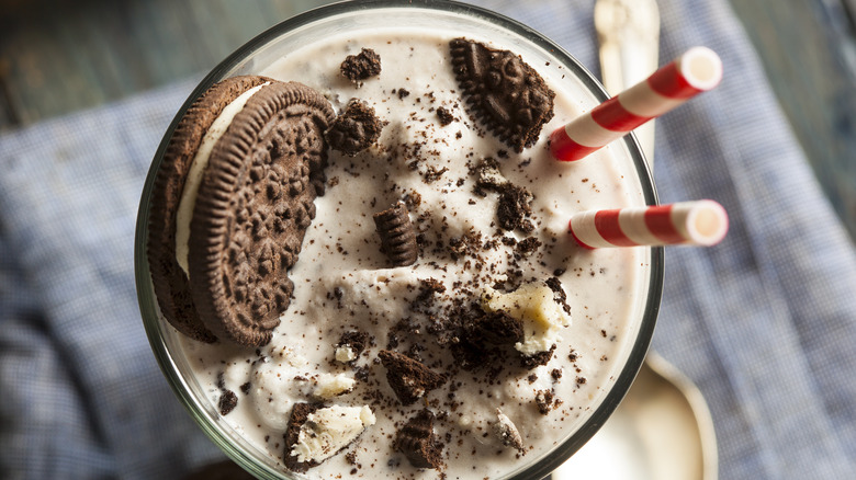 Chopped OREO cookies in milkshake