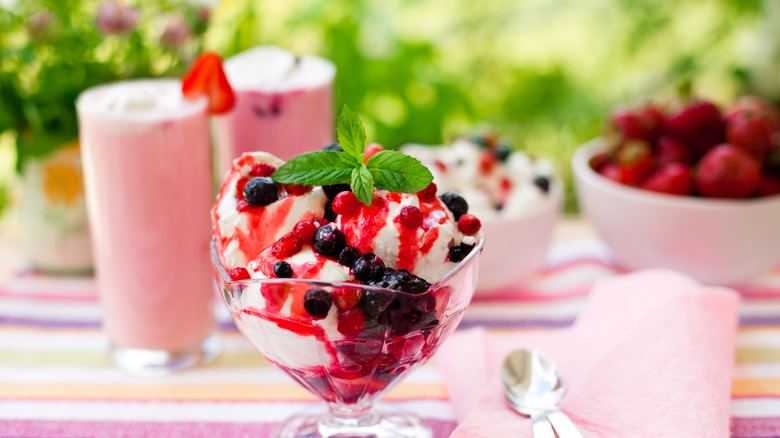 Fresh berry fruit on ice cream