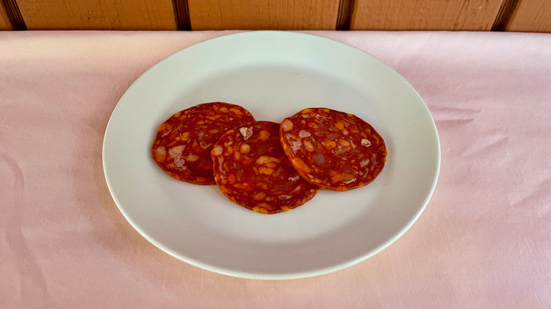 Chorizo Serrano slices on plate