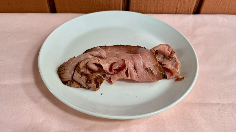 Roast beef slices on plate