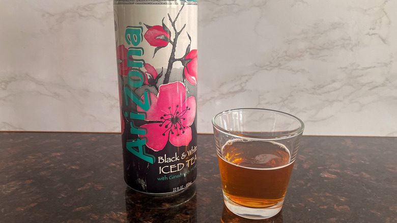 Arizona tea can with glass