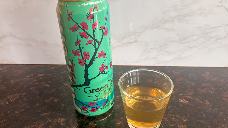 Arizona tea can with glass