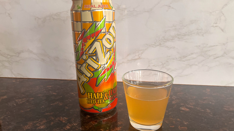 Arizona tea can with glass