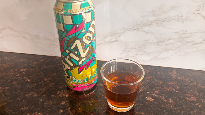 Arizona tea can with glass