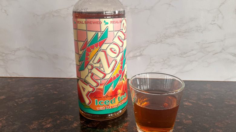 Arizona tea bottle with glass