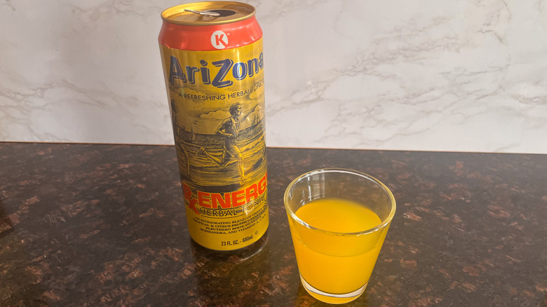 Arizona tea and small glass