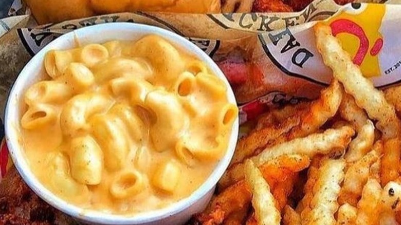 Macaroni and cheese in white cup