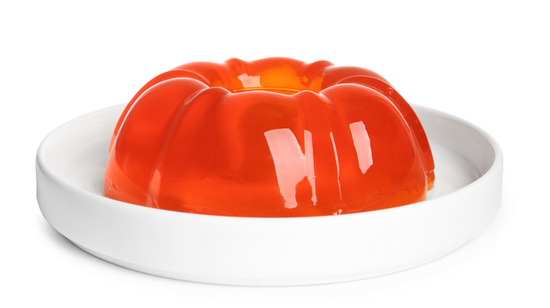 Orange jello form in bowl