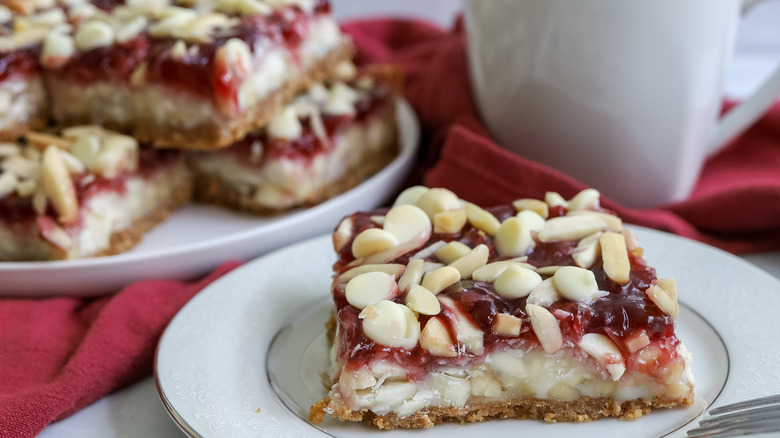 raspberry white chocolate layer bars on plates