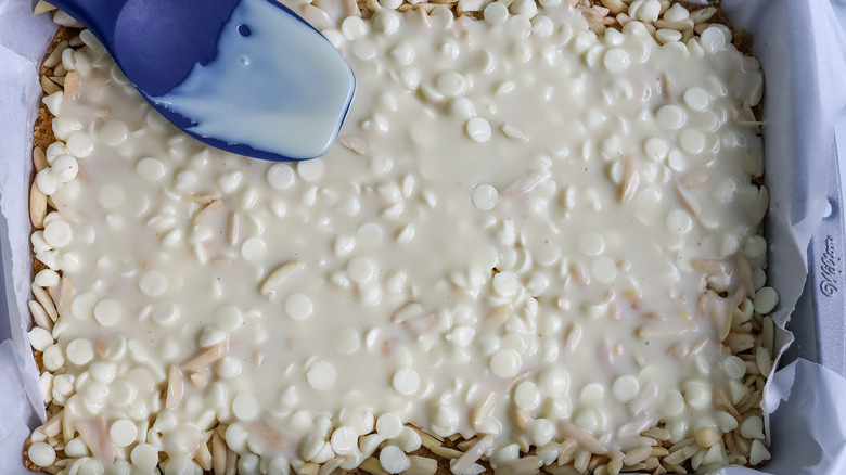 milk spreading over chocolate chips