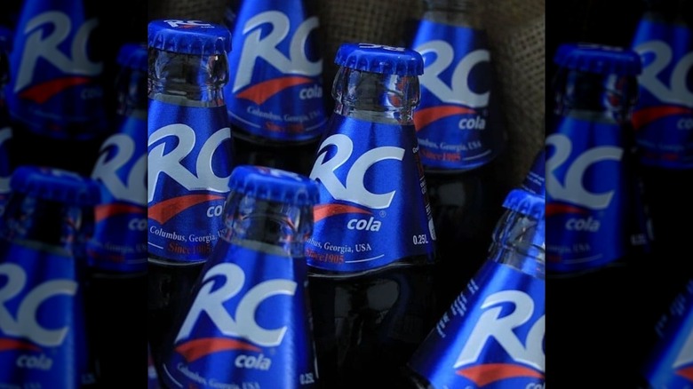 Close-up of many RC Cola bottles