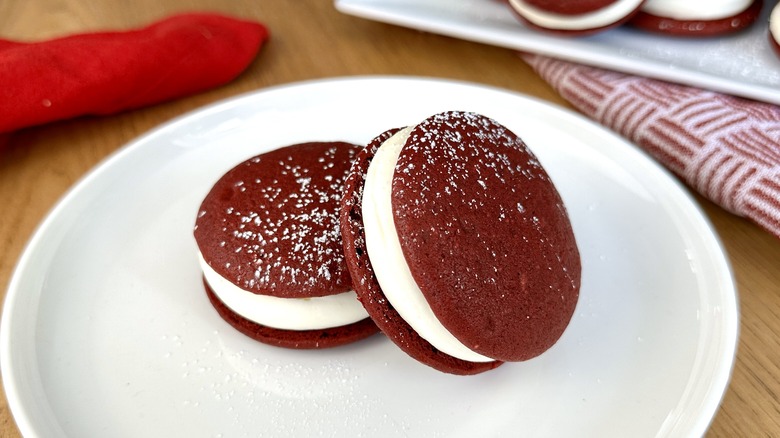 Red velvet whoopie pies on plate