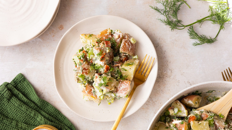 potato salad in white bowl