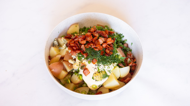 potato salad in white bowl