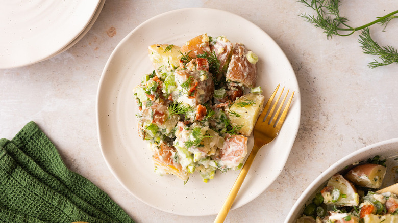 potato salad in white bowl