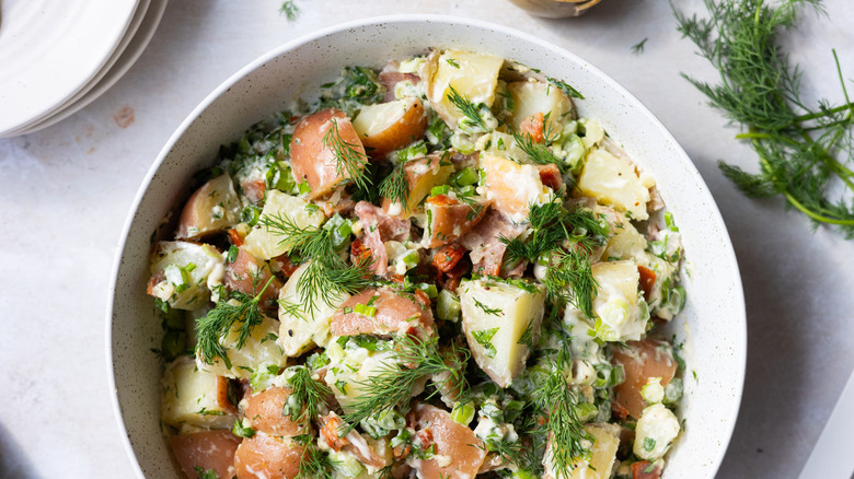 potato salad in white bowl