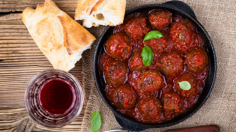 red wine with meatballs in marinara sauce