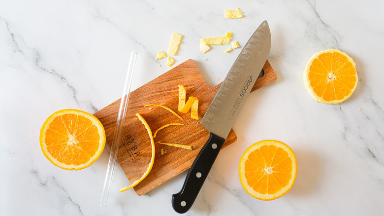 orange twist on cutting board