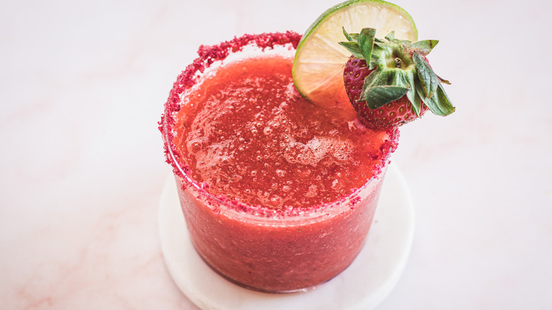 strawberry margarita with garnishes