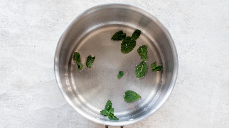 mint leaves in saucepan