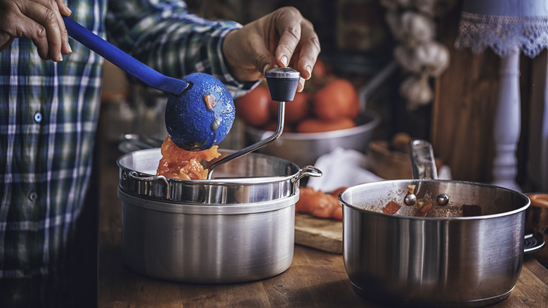 Making homemade tomato sauce 