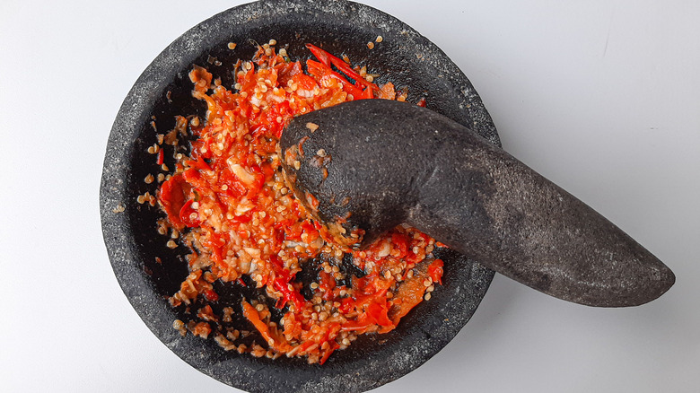 chili paste in mortar and pestle