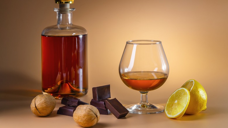Cognac with chocolate, walnuts, citrus