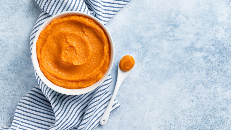 mashed carrots in a bowl