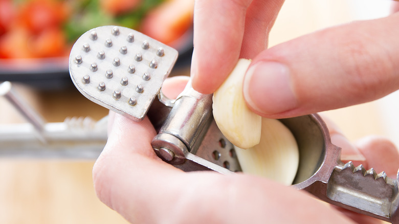 garlic in a garlic press