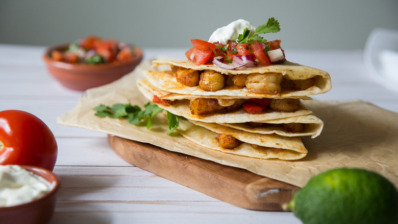 stacked shrimp quesadillas on table 