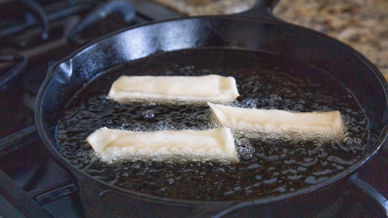 egg rolls in frying pan