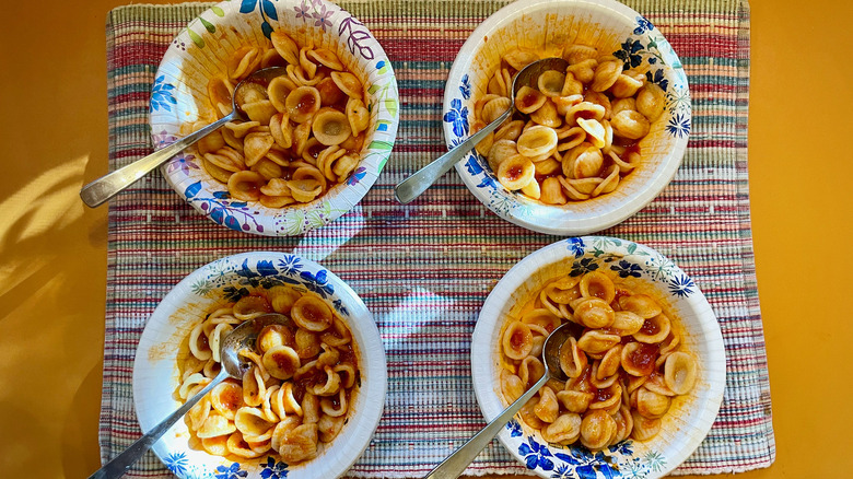 Four bowls of pasta