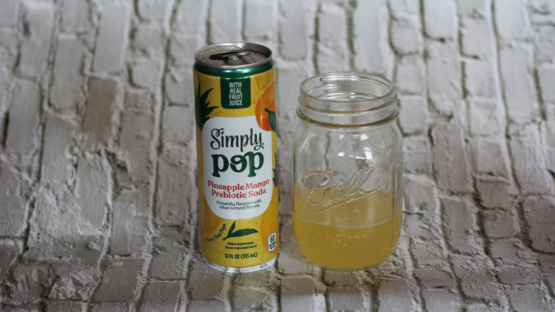 Pineapple mango Simply Pop soda with glass