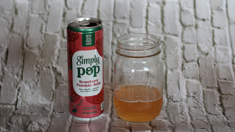 Simply Pop strawberry soda with glass