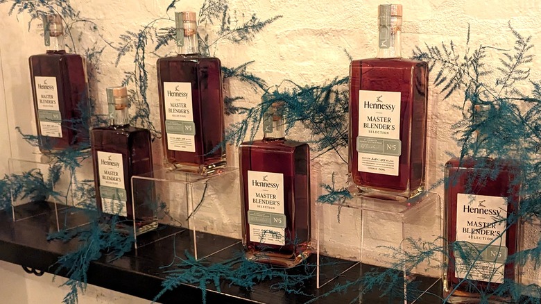 A row of Hennessy bottles