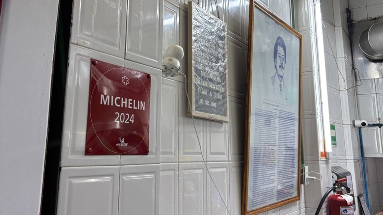 A michelin star plaque hanging on the wall