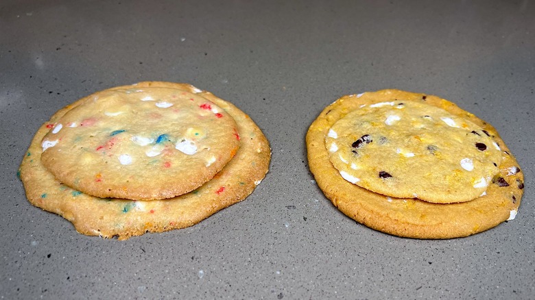 Two sizes of Milk Bar cookies