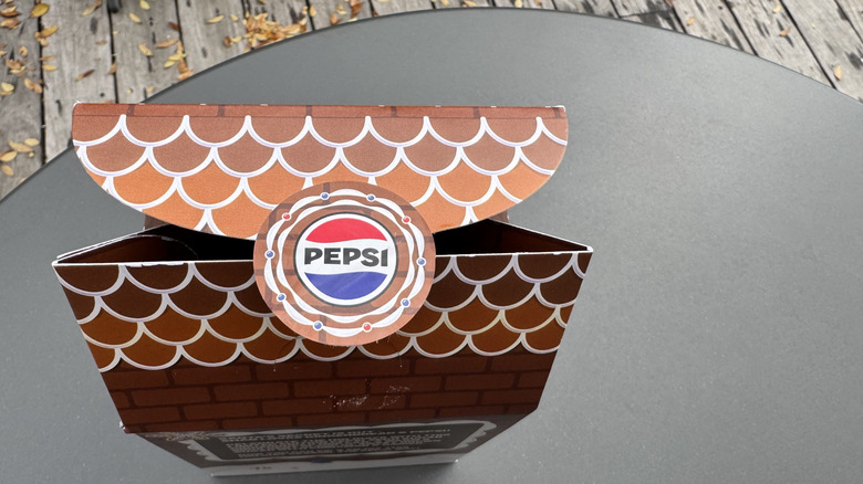 Pepsi Zero Sugar Gingerbread holiday box on table outdoors