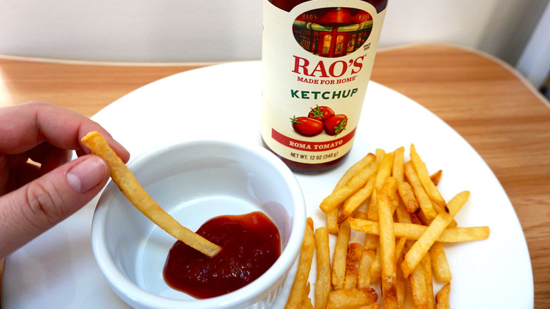 dipping fries in ketchup